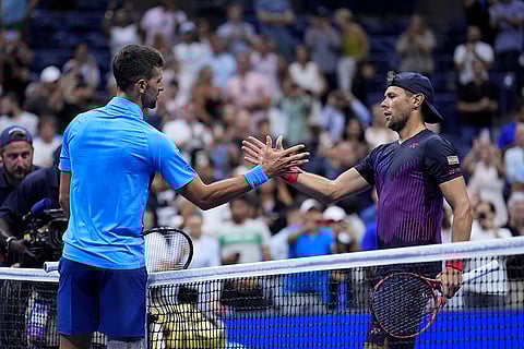 US Open 2024: Novak Djokovic, of Serbia, greets Radu Albot, of Moldova